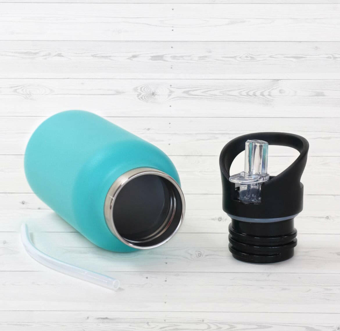 Bonjour Sip Box Premium Stainless Steel Insulated Water Bottle with Straw Lid and Handle Cap.