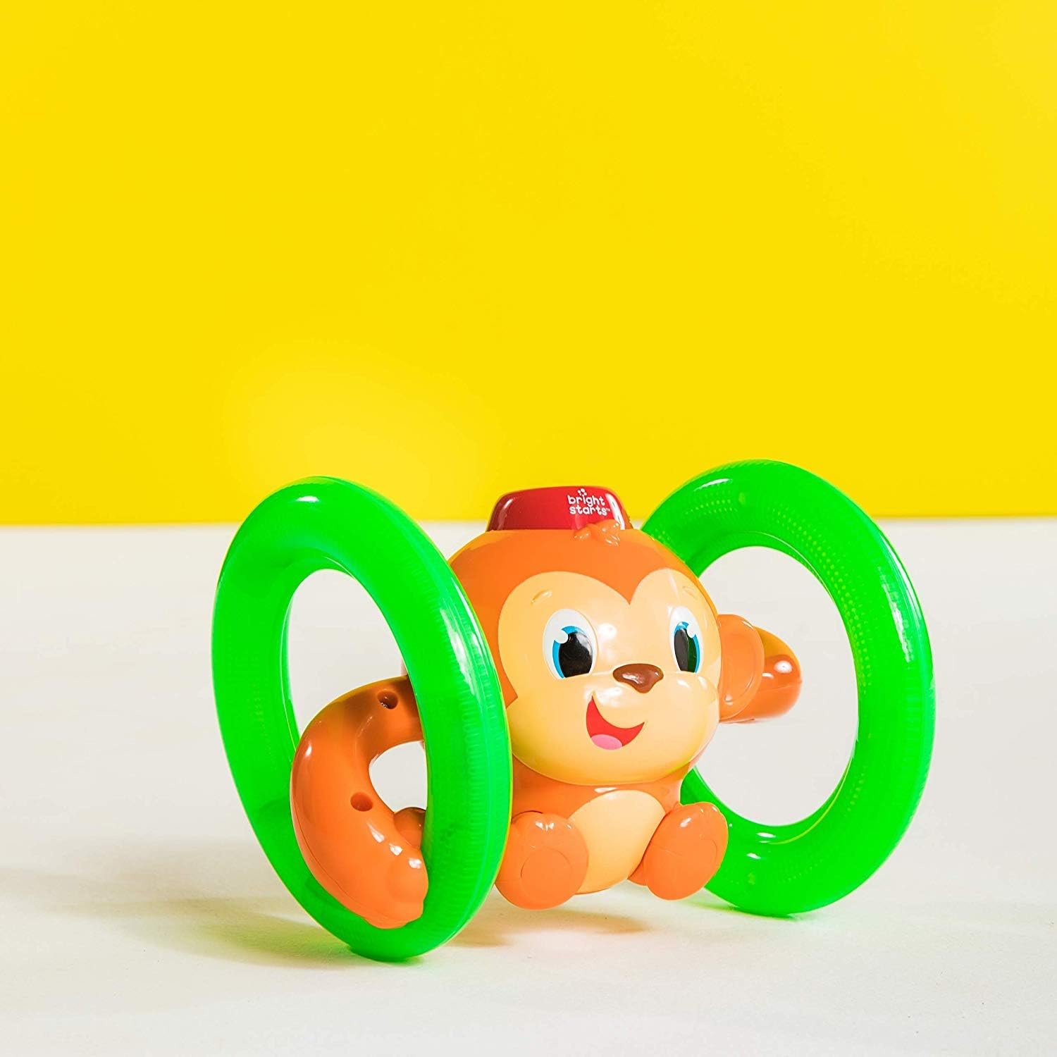 Bright Starts Roll Glow Monkey Crawling Baby Toy with Lights and Sou