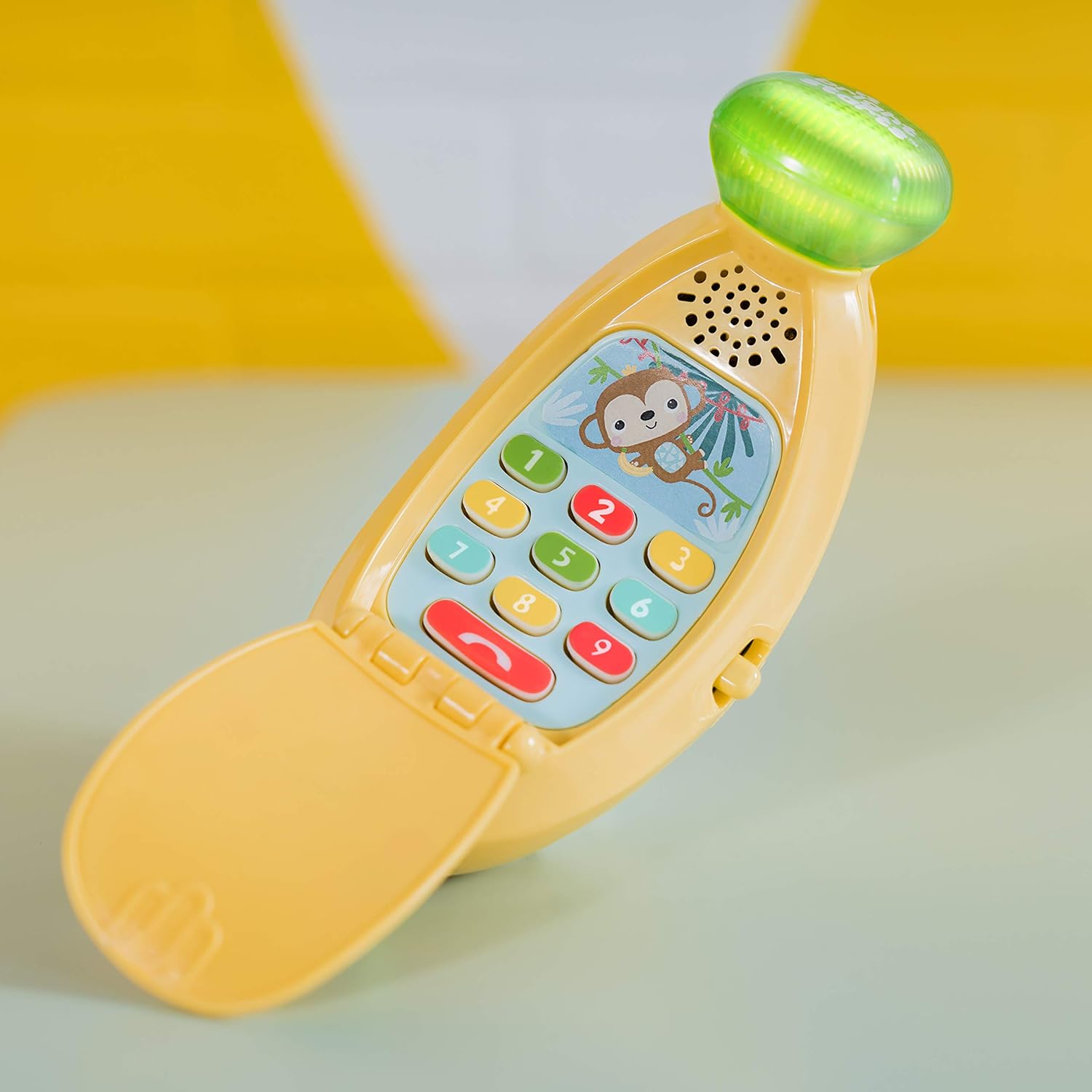 Bright Starts Babblin’ Banana Ring & Sing Light-Up Musical Baby Toy Flip Phone, 6 Months+