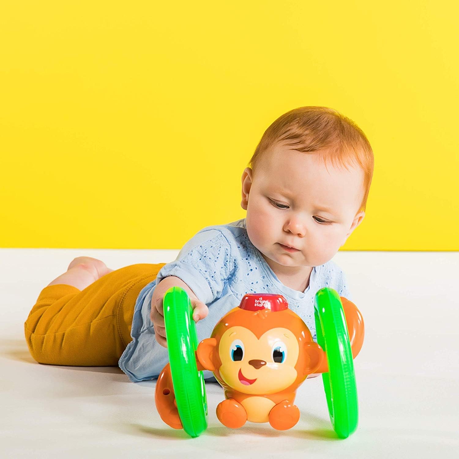Bright Starts Roll & Glow Monkey Crawling Baby Toy with Lights and Sounds