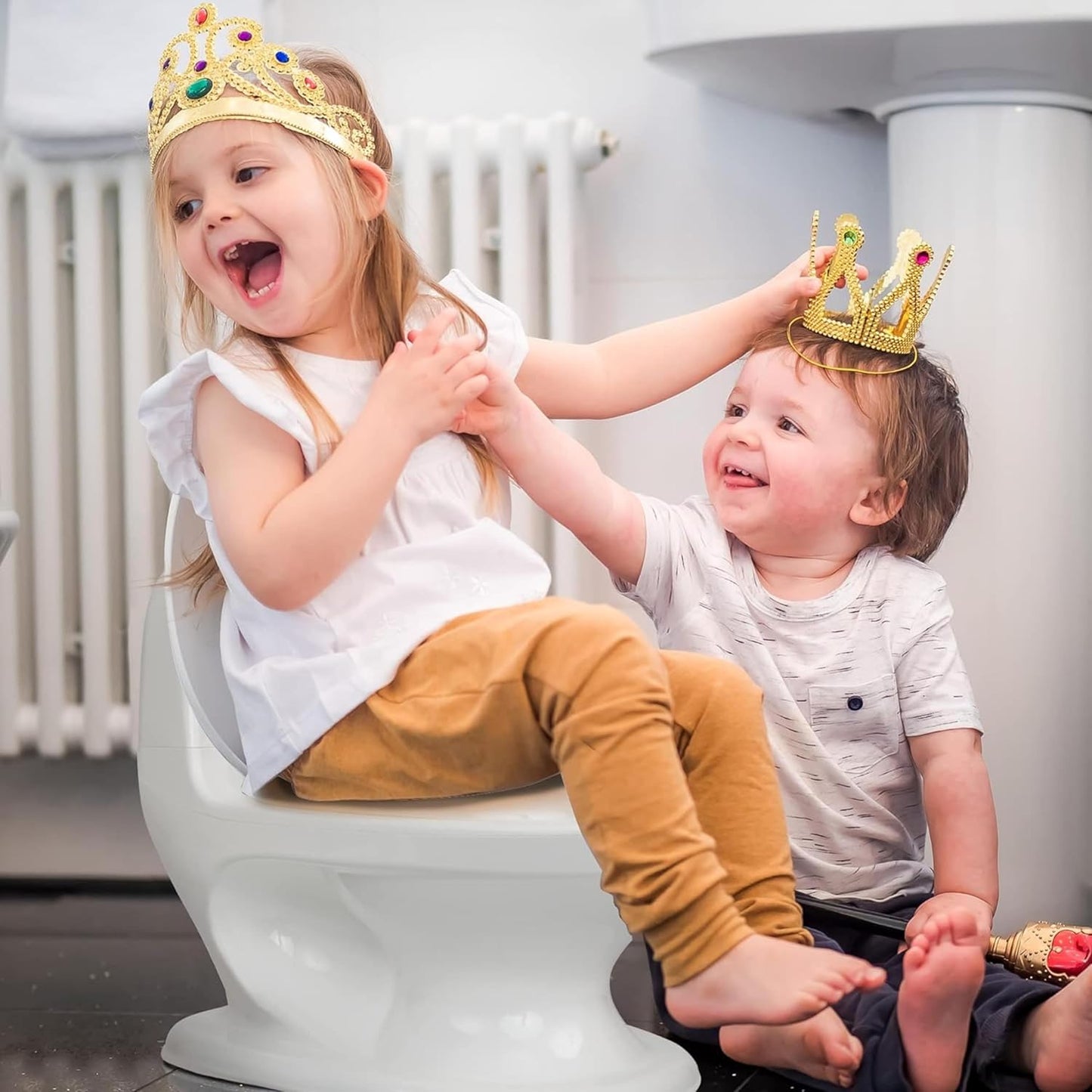 نونية Nuby My Real Potty الواقعية للأطفال الصغار (أبيض)
