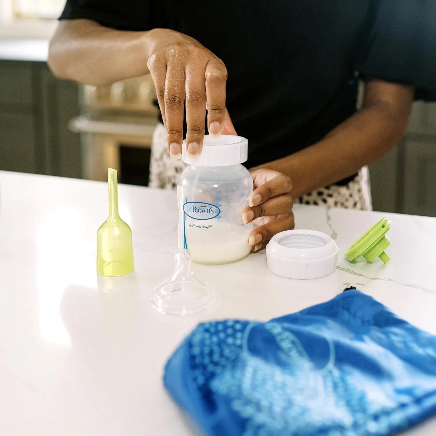 Dr. Brown's Silicone One-Piece Breast Pump, Hands-Free Breast Milk Collector with Anti-Colic Options+ Baby Bottle