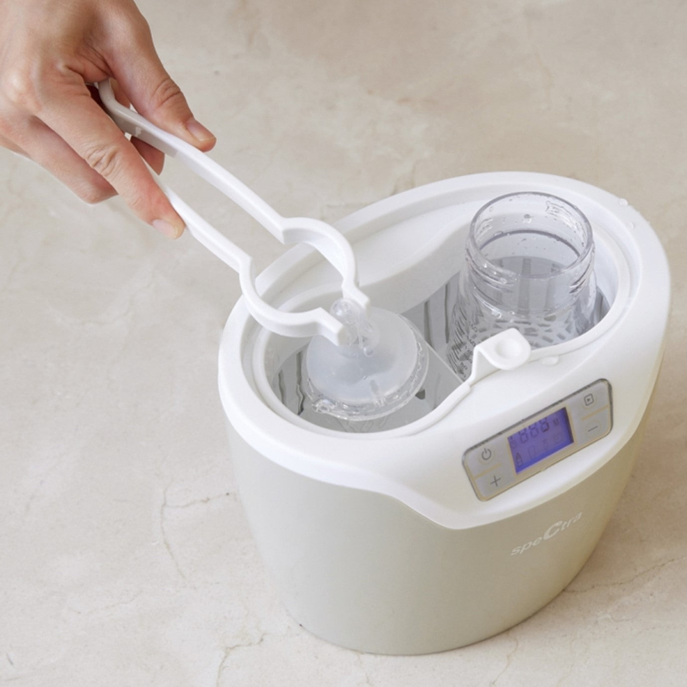 سبكترا لتدفئة الزجاجات