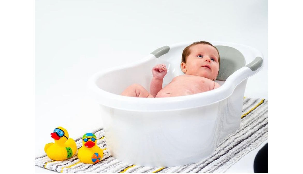 Nuby - Baby Bath With Built In Seat & Headrest.