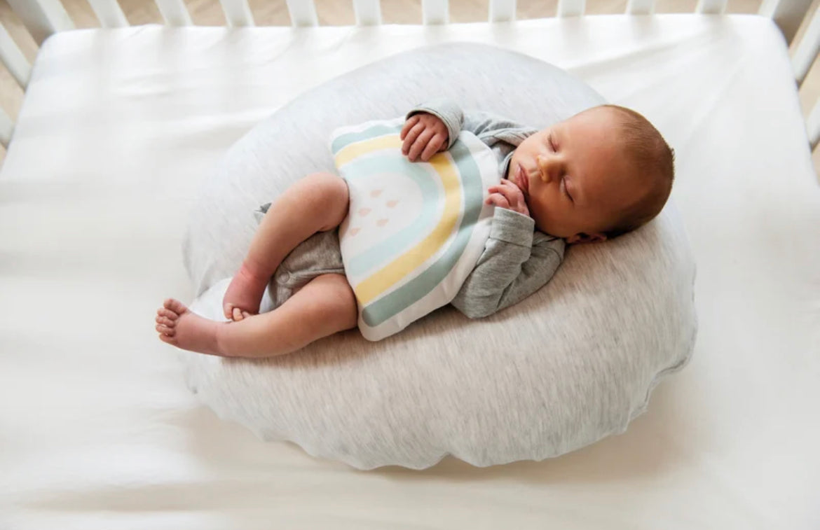Doomoo Baby Belly Pillow to Relieve Cramps.