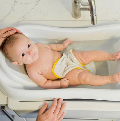 The First Years Sure Comfort Deluxe Newborn-to-Toddler Tub with Sling.